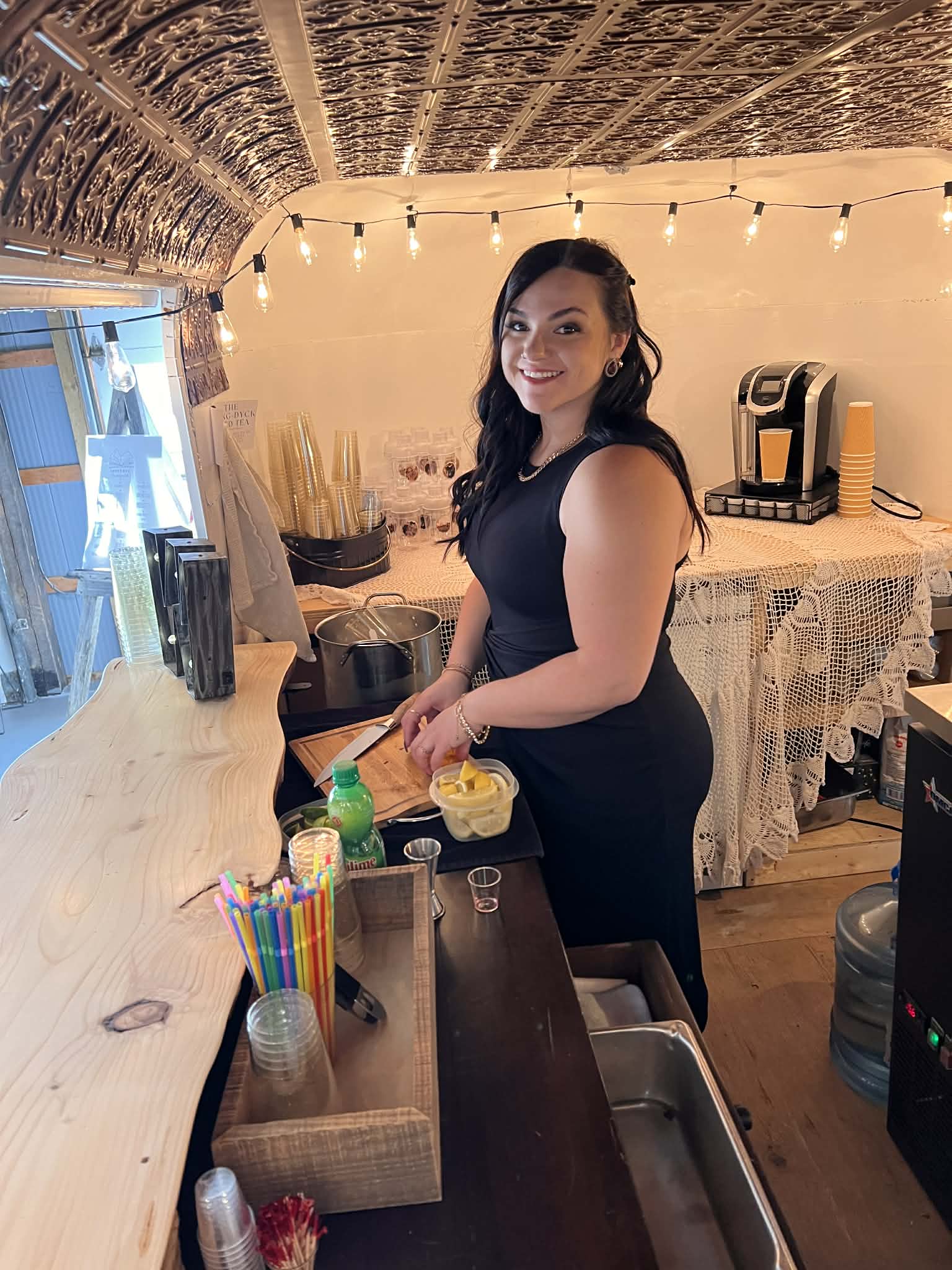 Alaura preparing drinks